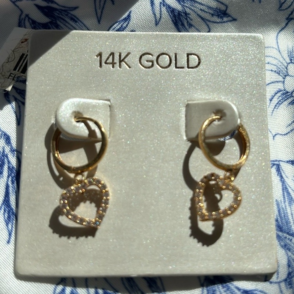 Heart dangling 14k gold earrings.